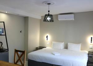 Katil atau katil-katil dalam bilik di Luxury Heights Bed and Breakfast +43 gambar
