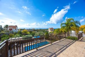 a balcony with a view of the ocean at Villa Sunlove in Peyia