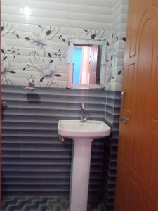 Koupelna v ubytování Krishna resort