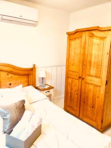 Postel nebo postele na pokoji v ubytování Lux Apartman Villa