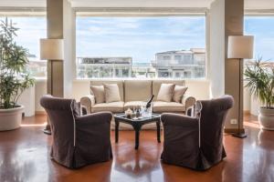 Posezení v ubytování Hotel Sina Astor