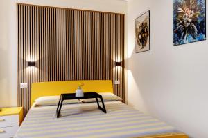 Ένα ή περισσότερα κρεβάτια σε δωμάτιο στο Casa Cattaleya +17 φωτογραφίες