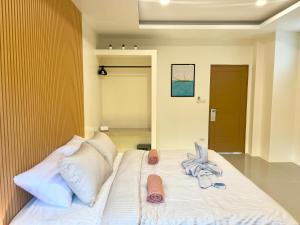 Postel nebo postele na pokoji v ubytování South Beach Inn