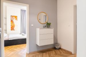 Postel nebo postele na pokoji v ubytování Mirage Studio