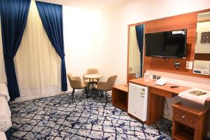 Kuchyň nebo kuchyňský kout v ubytování فندق نجمة العزيزية hotel Star AL Aziziyah