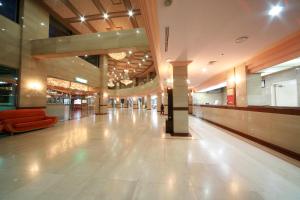 an empty lobby of a shopping center with a hallway at Hyundai Soo Resort Sokcho in Sokcho
