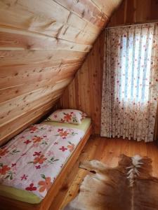 Postel nebo postele na pokoji v ubytování Glamping apartma Oaza miru