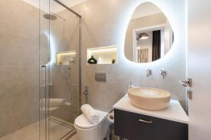 Koupelna v ubytování Oasis Luxe Boutique Suites by BQA