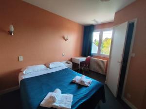 Postel nebo postele na pokoji v ubytování A L'Orée du Bois chez Doudou&Lolo