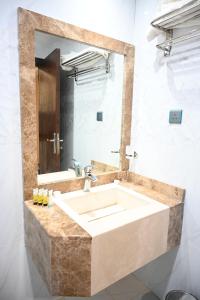 Koupelna v ubytování فندق نجمة العزيزية hotel Star AL Aziziyah