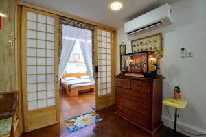 Una cama o camas en una habitación de Japan Comfort Lifestyle Hokkaido 11 fotos más