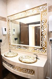 Koupelna v ubytování فندق نجمة العزيزية hotel Star AL Aziziyah