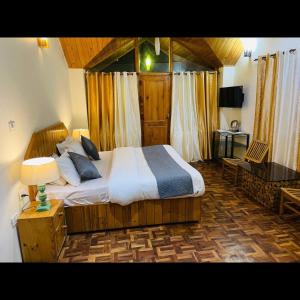 Imagen de la galería de Cloud 9 wooden villa, en Manali