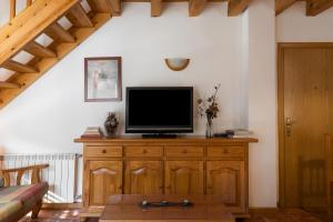 TV a/nebo společenská místnost v ubytování Casa Samarra