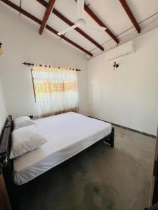 Ένα ή περισσότερα κρεβάτια σε δωμάτιο στο Bonuka Villa