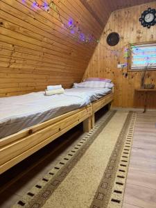 Postel nebo postele na pokoji v ubytování Vila Presjenica + 11 fotografií