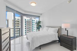 Postel nebo postele na pokoji v ubytování High Rise Ocean View Condo 2BR 2.5BA + 40 fotografií