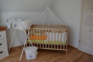 Ein Bett oder Betten in einem Zimmer der Unterkunft Boddenblick - Breege