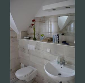 Ein Badezimmer in der Unterkunft Boddenblick - Breege