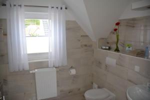 Ein Badezimmer in der Unterkunft Boddenblick - Breege