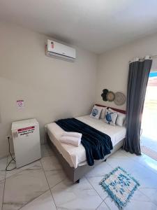 Pousada Caminho de Moises客房内的一张或多张床位