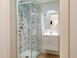 a bathroom with a shower and a sink at L'altro Krisà in Bari +167 photos