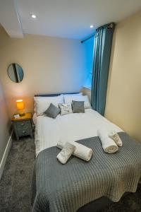 Postel nebo postele na pokoji v ubytování Florence Cottage