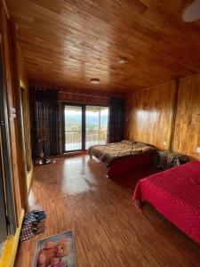 Giường trong phòng chung tại Dâu Homestay