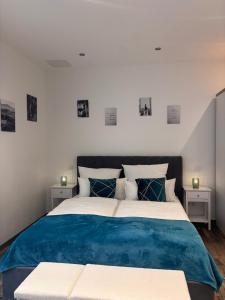 Postel nebo postele na pokoji v ubytování Apartmenthaus Wertheim
