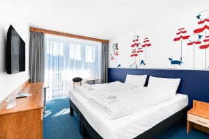 TV a/nebo společenská místnost v ubytování ibis Styles Relax Roznov pod Radhostem