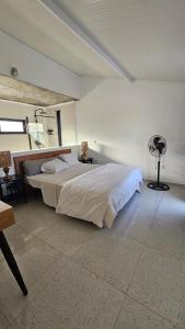 Letto o letti in una camera di Serene Escape in Porto Madeira