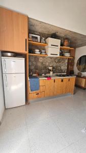 Cucina o angolo cottura di Serene Escape in Porto Madeira