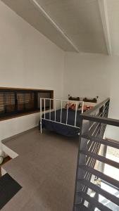 Letto o letti in una camera di Serene Escape in Porto Madeira