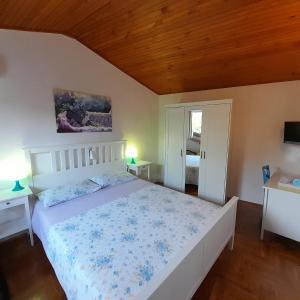 Postel nebo postele na pokoji v ubytování Apartments Renata - Brseč