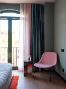 Postel nebo postele na pokoji v ubytování Numa Lisbon Anjos