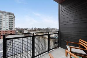 a balcony with a view of a city at Jade Junction in Atlanta