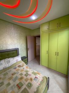 Postel nebo postele na pokoji v ubytování Modern Apartment near Agadir - Fast WiFi & Parking