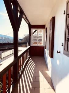 a balcony of a house with a window at Haus Schöne Aussicht in Arzbach in Arzbach