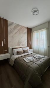 Postel nebo postele na pokoji v ubytování B&B IV Novembre