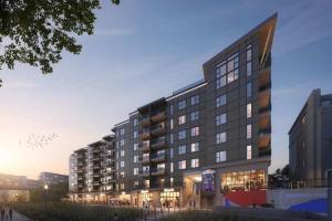 a rendering of a building with lights on at Jade Junction in Atlanta