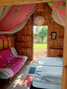 Postel nebo postele na pokoji v ubytování Finca Alto Bonito