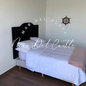 Ένα ή περισσότερα κρεβάτια σε δωμάτιο στο The Loft en Mar Del Castle
