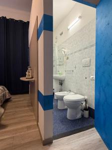Vannituba majutusasutuses Albergo Astro