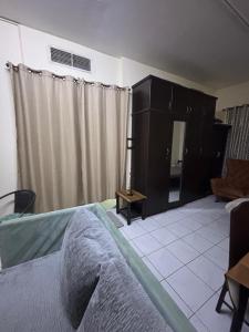Postel nebo postele na pokoji v ubytování Studio Apartment