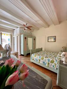 Ένα ή περισσότερα κρεβάτια σε δωμάτιο στο A casa di Nicoletta