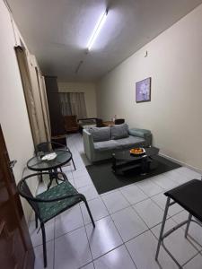 Posezení v ubytování Studio Apartment