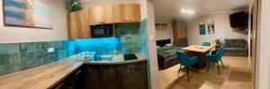 Kuchyň nebo kuchyňský kout v ubytování Spengler Apartman