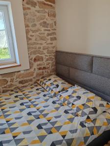 Postel nebo postele na pokoji v ubytování Šimun&Jakov