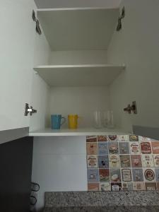 Kuchyň nebo kuchyňský kout v ubytování Apartamento 102