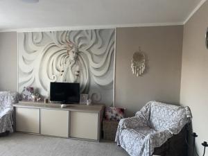 Μια τηλεόραση ή/και κέντρο ψυχαγωγίας στο JessApartment